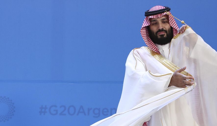 Saudi Arabia&#39;s Crown Prince Mohammed bin Salman adjusts his robe as leaders gather for the group at the G20 Leader&#39;s Summit at the Costa Salguero Center in Buenos Aires, Argentina, Nov. 30, 2018. (AP Photo/Ricardo Mazalan, File)