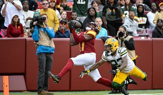 Washington Commanders receiver Terry McLaurin (17) hauls in a 37-yard touchdown reception against the Green Bay Packers at FedEx Field, Landover, MD, October 23, 2022. (Photo by Brian Murphy)