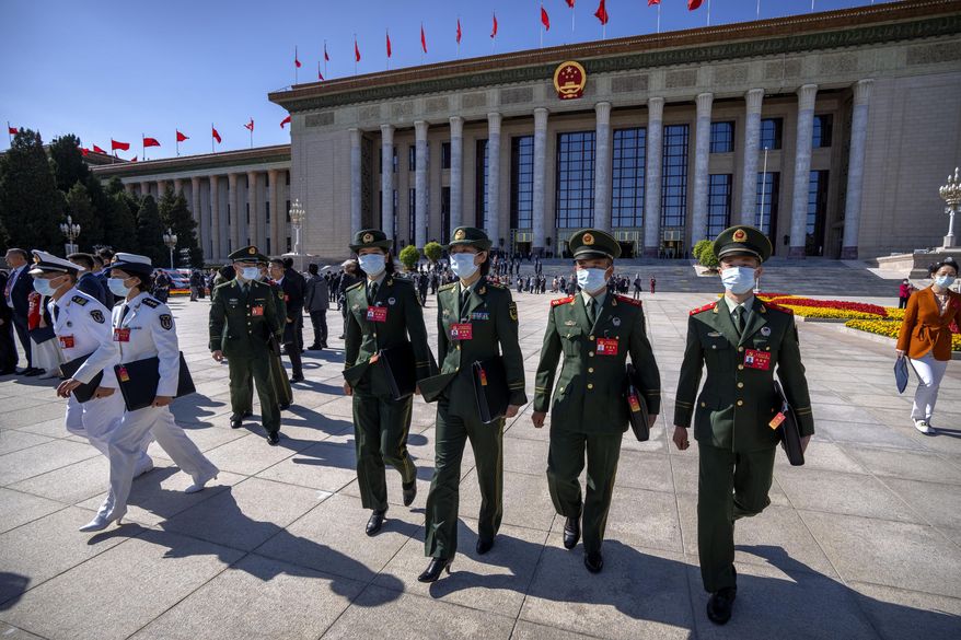 Military attendees leave after the opening ceremony of the 20th National Congress of China&#x27;s ruling Communist Party at the Great Hall of the People in Beijing on Oct. 16, 2022. In a speech that used the word security 26 times, Chinese leader Xi Jinping said Beijing will &amp;quot;work faster&amp;quot; to modernize the party&#x27;s military wing, the People&#x27;s Liberation Army, and &amp;quot;enhance the military&#x27;s strategic capabilities.&amp;quot; (AP Photo/Mark Schiefelbein, File)