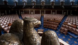 The chamber of the House of Representatives is seen at the Capitol in Washington, Monday, Feb. 28, 2022. Democrats have held both chambers of Congress and the presidency for two years. But they may not have such consolidated power for much longer. (AP Photo/J. Scott Applewhite, File)