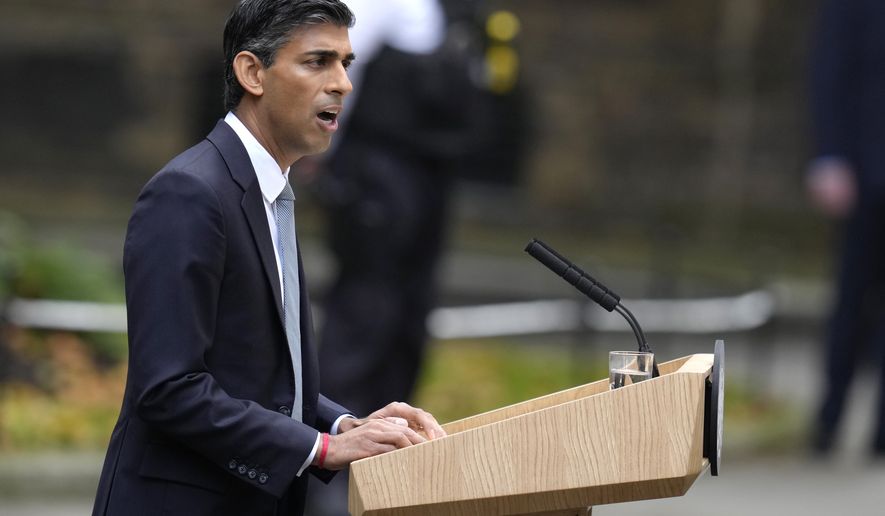 British Prime Minister Rishi Sunak delivers a speech at 10 Downing Street in London, Tuesday, Oct. 25, 2022. New British Prime Minister Rishi Sunak arrived at Downing Street Tuesday after returning from Buckingham Palace where he was invited to form a government by Britain&#x27;s King Charles III. (AP Photo/Kirsty Wigglesworth)