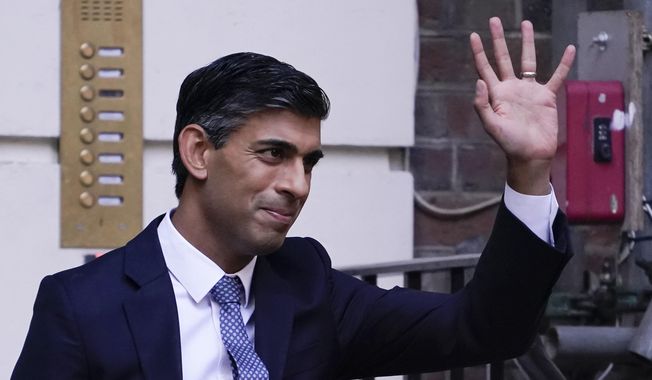 Rishi Sunak leaves the Conservative Campaign Headquarters in London, Monday, Oct. 24, 2022. Rishi Sunak will become the next Prime Minister after winning the Conservative Party leadership contest. (AP Photo/Aberto Pezzali)