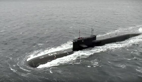 In this handout photo taken from video released by Russian Defense Ministry Press Service on Wednesday, Oct. 26, 2022, the Tula nuclear submarine of the Russian navy is on a mission to conduct a practice launch of an intercontinental ballistic missile as part of drills of the country&#x27;s nuclear forces. Russian President Vladimir Putin has monitored drills of the country&#x27;s strategic nuclear forces involving multiple practice launches of ballistic and cruise missiles. The Kremlin said in a statement that all the test-fired missiles reached their designated targets. (Russian Defense Ministry Press Service via AP)