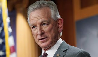 Sen. Tommy Tuberville, R-Ala., listens to a question during a news conference March 30, 2022, in Washington. Tuberville said Tuesday, Oct. 25, 2022 that the country has too many “takers” instead of workers and suggested that many in younger generations — including people in their 40s — do not understand that they need to work. (AP Photo/Mariam Zuhaib, File)