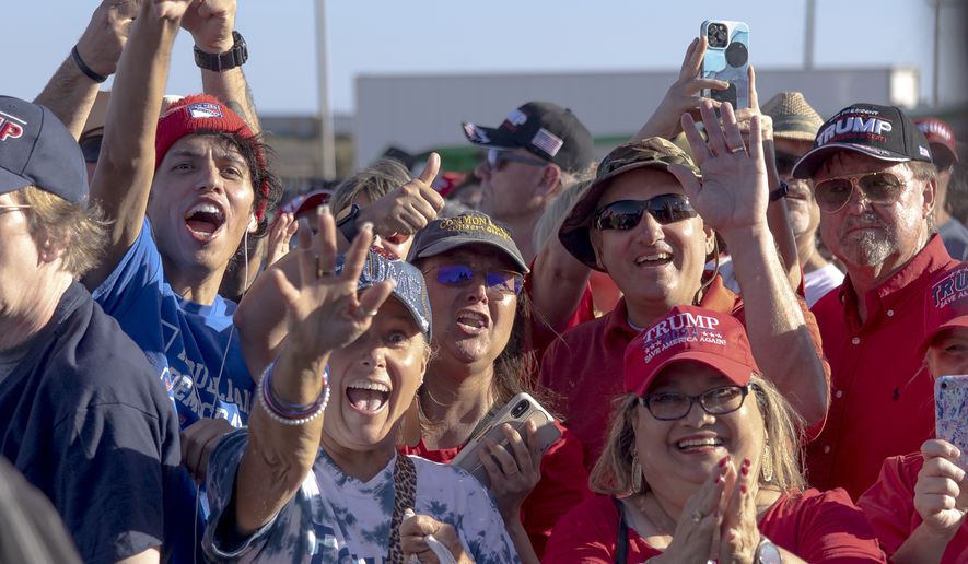 People react with delight during a rally featuring former President Donald Trump, My Pillow CEO Mike Lindell and other crowd favorites on Saturday, Oct. 22, 2022, in Robstown, Texas. (AP Photo/Nick Wagner)