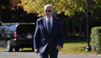 President Joe Biden walks to talk to reporters before boarding Marine One on the South Lawn of the White House, Thursday, Oct. 27, 2022, in Washington. (AP Photo/Evan Vucci)