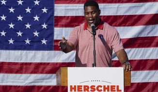 Republican candidate for U.S. Senate Herschel Walker speaks during a campaign stop in Cumming, Ga., Thursday, Oct. 27, 2022. (AP Photo/John Bazemore)
