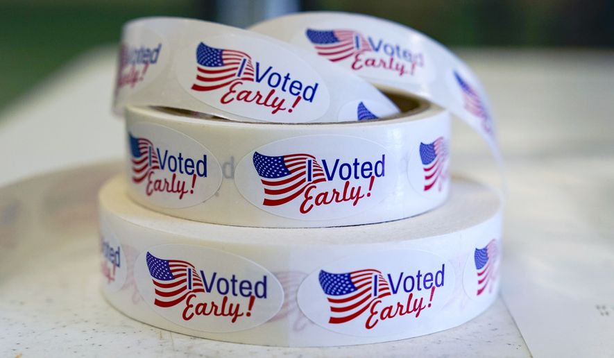 Rolls of &quot;I Voted Early&quot; stickers await voters in the final hours of early voting in the primary election in Noblesville, Ind., May 2, 2022. (AP Photo/Michael Conroy, File)