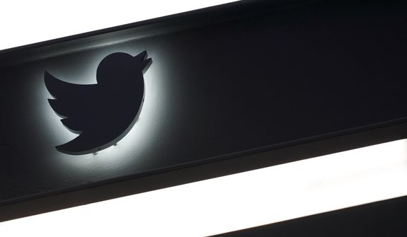 The Twitter logo is seen on the awning of the building that houses the Twitter office in New York, Wednesday, Oct. 26, 2022. (AP Photo/Mary Altaffer)