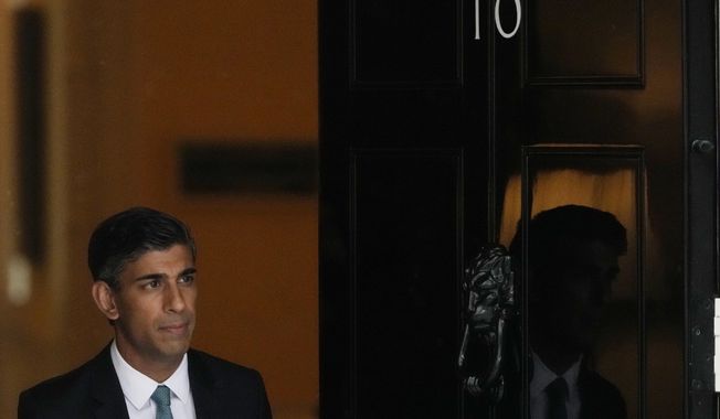 Britain&#x27;s Prime Minister Rishi Sunak leaves 10 Downing Street for the House of Commons for his first Prime Minister&#x27;s Questions in London, Wednesday, Oct. 26, 2022. Sunak was elected by the ruling Conservative party to replace Liz Truss who resigned. (AP Photo/Frank Augstein)