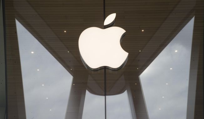 In this Jan. 3, 2019, file photo the Apple logo is displayed at the Apple store in the Brooklyn borough of New York.  Apple Inc. reports quarterly financial results after the market close, Thursday, Oct. 27, 2022.(AP Photo/Mary Altaffer, File)