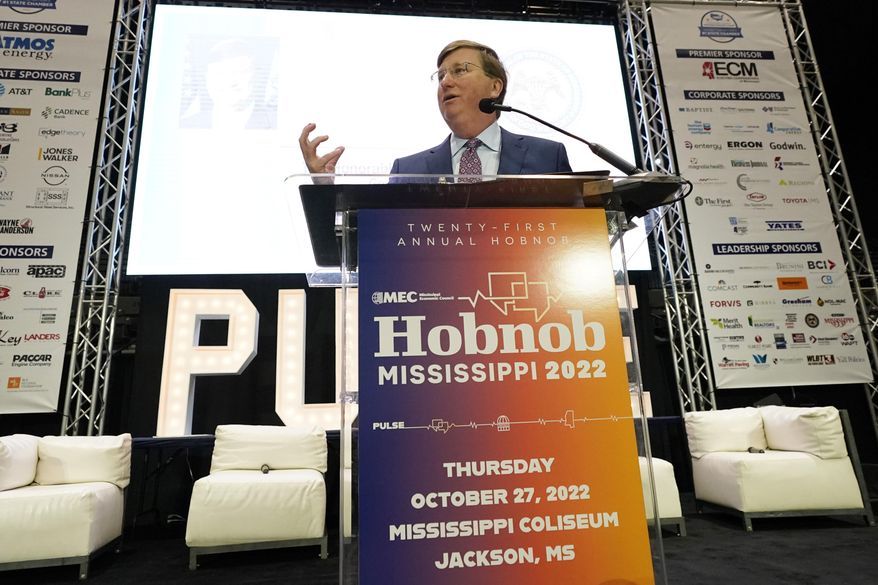 Mississippi Gov. Tate Reeves addresses business leaders at the Mississippi Economic Council's annual "Hobnob Mississippi" in Jackson, Miss., Thursday, Oct. 27, 2022. Reeves expressed a desire for the elimination of the state's income tax during his address. (AP Photo/Rogelio V. Solis)