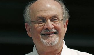 Author Salman Rushdie appears during the Mississippi Book Festival in Jackson, Miss., on Aug. 18, 2018. The U.S. is imposing financial penalties on an Iranian-based organization that raised money to target British-American author Rushdie, who was violently attacked at an August literary event. (AP Photo/Rogelio V. Solis, File) **FILE**