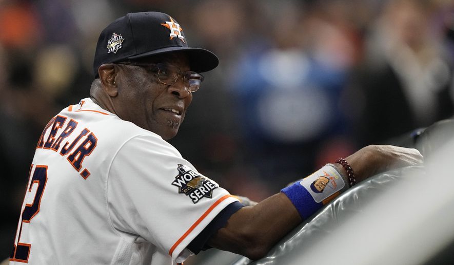 Houston Astros manager Dusty Baker Jr. smiles during induction before Game 1 of baseball&#x27;s World Series between the Houston Astros and the Philadelphia Phillies on Friday, Oct. 28, 2022, in Houston. (AP Photo/David J. Phillip)