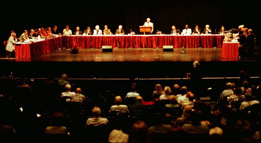 This July 22, 1997 photo shows Panel members reviewing the state constitution in Panama City, Fla. Florida voters are being asked to get rid of a commission that meets every 20 years to recommend changes to the state constitution, the only such panel among the U.S. states that can refer amendments directly to a statewide ballot. Opponents of Constitution Revision Commission maintain say it has gone beyond its original mandate and lacks accountability. (Vern Miller/News Herald via AP)