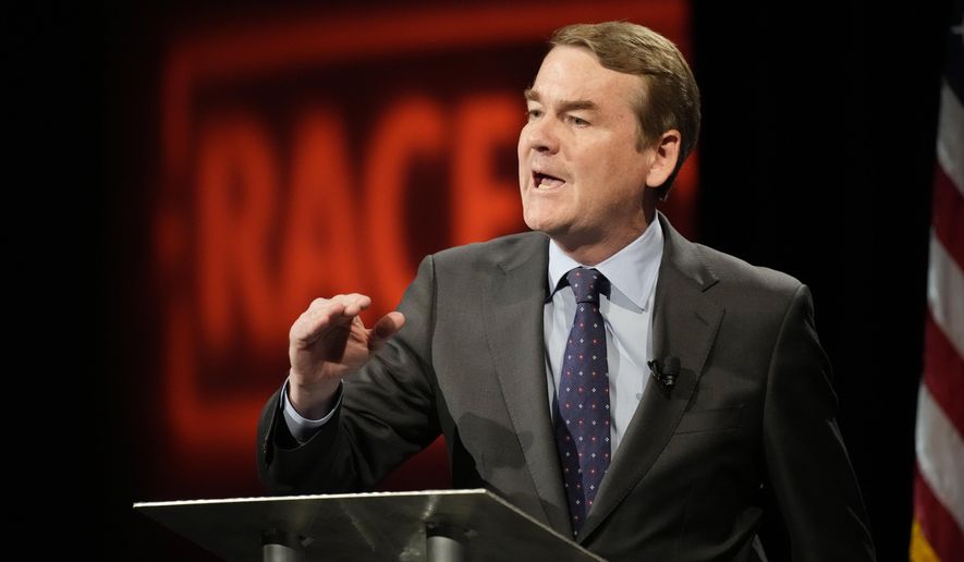Democratic U.S. Sen. Michael Bennet speaks during a debate with Republican challenger Joe O'Dea, Friday, Oct. 28, 2022, on the campus of Colorado State University in Fort Collins, Colo. (AP Photo/David Zalubowski)
