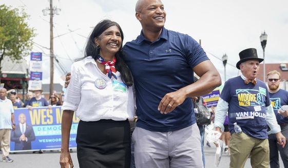 Maryland&#39;s Democratic gubernatorial nominee Wes Moore, right, and lieutenant governor nominee Aruna Miller walk together during a Labor Day parade in Gaithersburg, Md., on Sept. 5, 2022. Moore could soon make history if elected Maryland&#39;s first Black governor, and he&#39;s not alone: Rep. Anthony Brown would be the state&#39;s first Black attorney general. Miller would be Maryland&#39;s first immigrant lieutenant governor, and the first Asian-American elected statewide. (AP Photo/Bryan Woolston, File)