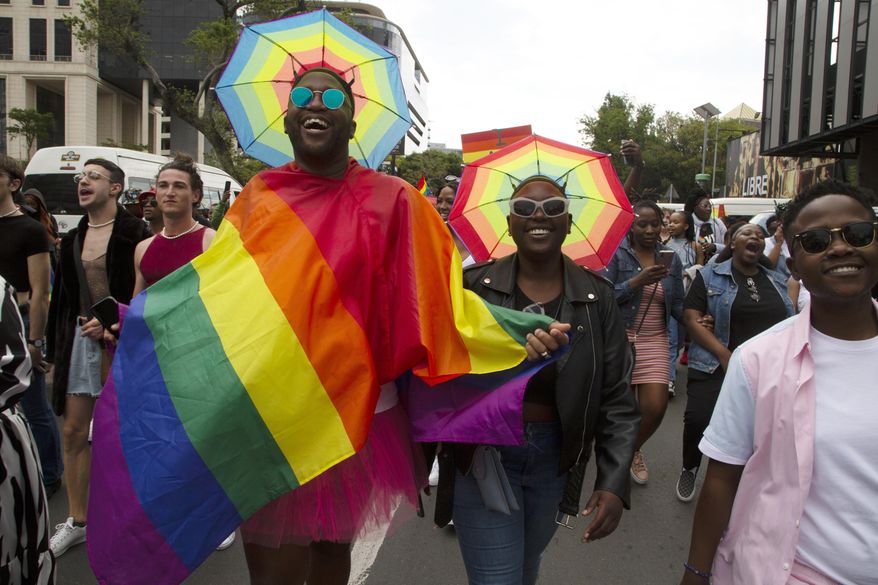 Members of the LGTBQ community take part in a Pride march in Sandton, Johannesburg, Saturday, Oct. 29, 2022. (AP Photo/Denis Farrell)