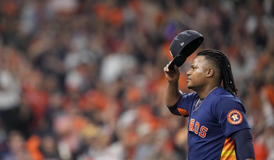 Houston Astros starting pitcher Framber Valdez tips his cap as he leaves the game during the seventh inning in Game 2 of baseball&#39;s World Series between the Houston Astros and the Philadelphia Phillies on Saturday, Oct. 29, 2022, in Houston. (AP Photo/David J. Phillip)