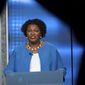 Democratic challenger Stacey Abrams faces off with Republican Georgia Gov. Brian Kemp in a televised debate, in Atlanta, Sunday, Oct. 30, 2022. (AP Photo/Ben Gray)
