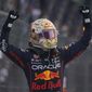 Red Bull driver Max Verstappen, of the Netherlands, celebrates his victory in the Formula One Mexico Grand Prix at the Hermanos Rodriguez racetrack in Mexico City, Sunday, Oct. 30, 2022. (AP Photo/Fernando Llano)