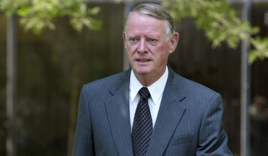 Fairfax Commonwealth attorney Robert Horan Jr. leaves the Fairfax County Courthouse on Tuesday, June 22, 2004, in Fairfax, Va. Horan Jr., who secured a murder conviction of D.C. sniper Lee Boyd Malvo during his four-decade tenure as the top prosecutor in Virginia’s largest county, died on Friday, Oct. 28, 2022, at his home in Clifton, Va. He was 90. (AP Photo/Evan Vucci, File