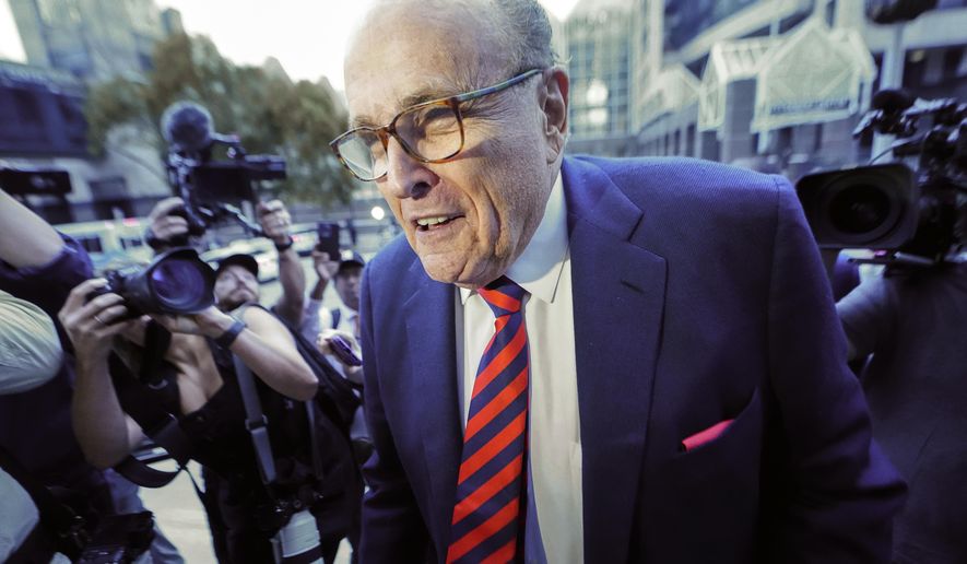 Rudy Giuliani arrives at the Fulton County Courthouse on Wednesday, Aug. 17, 2022, in Atlanta. On Monday, Oct. 31, 2022, a federal judge declined to dismiss a defamation lawsuit filed against former New York City Mayor Giuliani by two women who served as election workers in Georgia in November 2020. (AP Photo/John Bazemore, File)