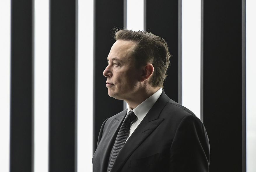 Elon Musk, Tesla CEO, attends the opening of the Tesla factory in Gruenheide, Germany, on March 22, 2022. (Patrick Pleul/Pool via AP, File)