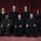 Members of the Supreme Court sit for a new group portrait following the addition of Associate Justice Ketanji Brown Jackson, at the Supreme Court building in Washington, Oct. 7, 2022. Bottom row, from left, Associate Justice Sonia Sotomayor, Associate Justice Clarence Thomas, Chief Justice of the United States John Roberts, Associate Justice Samuel Alito, and Associate Justice Elena Kagan. Top row, from left, Associate Justice Amy Coney Barrett, Associate Justice Neil Gorsuch, Associate Justice Brett Kavanaugh, and Associate Justice Ketanji Brown Jackson. (AP Photo/J. Scott Applewhite, File)
