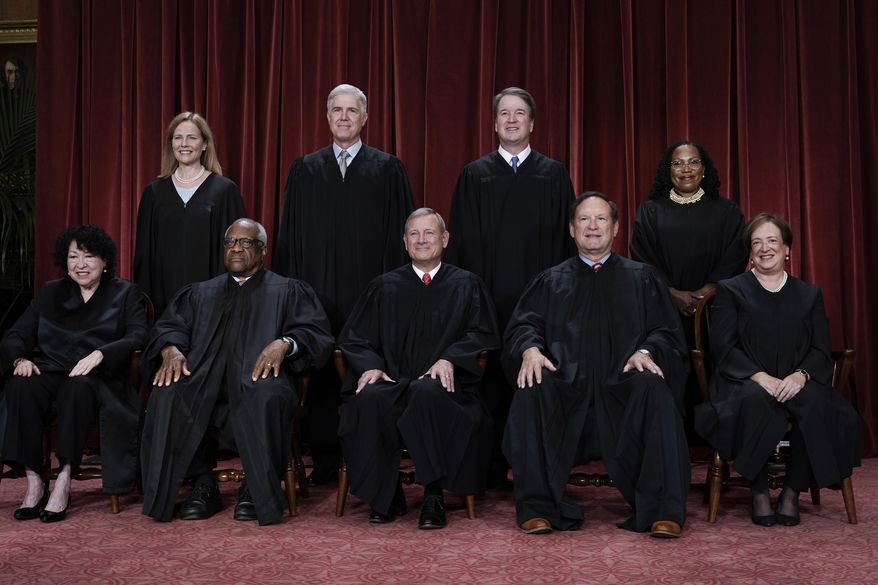 Members of the Supreme Court sit for a new group portrait following the addition of Associate Justice Ketanji Brown Jackson, at the Supreme Court building in Washington, Oct. 7, 2022. Bottom row, from left, Associate Justice Sonia Sotomayor, Associate Justice Clarence Thomas, Chief Justice of the United States John Roberts, Associate Justice Samuel Alito, and Associate Justice Elena Kagan. Top row, from left, Associate Justice Amy Coney Barrett, Associate Justice Neil Gorsuch, Associate Justice Brett Kavanaugh, and Associate Justice Ketanji Brown Jackson. (AP Photo/J. Scott Applewhite, File)