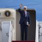 President Joe Biden waves as he boards Air Force One at Andrews Air Force Base, Md., Tuesday, Nov. 1, 2022, en route to Florida. (AP Photo/Jess Rapfogel)