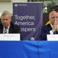 U.S. Agriculture Sec. Tom Vilsack, left, and Mitch Landrieu, White House senior adviser, listen at a community panel on rural high-speed internet at Wake Tech Community College in Raleigh, N.C., on Thursday, Oct. 27, 2022. (AP Photo/Allen G. Breed)