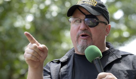 Stewart Rhodes, founder of the citizen militia group known as the Oath Keepers, speaks during a rally outside the White House in Washington, on June 25, 2017. (AP Photo/Susan Walsh, File)