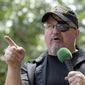 Stewart Rhodes, founder of the citizen militia group known as the Oath Keepers, speaks during a rally outside the White House in Washington, on June 25, 2017. (AP Photo/Susan Walsh, File)