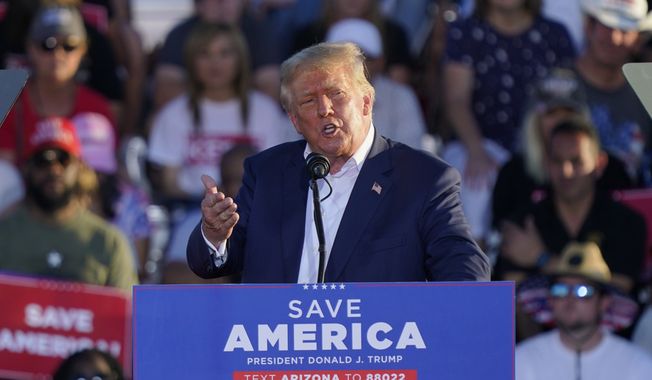 Former President Donald Trump speaks at a rally, Oct. 9, 2022, in Mesa, Ariz. Trump has been teasing another presidential run since before he left the White House. But aides to the former president are now preparing for a 2024 campaign that could be announced soon after next week&#x27;s midterms. (AP Photo/Matt York, File)