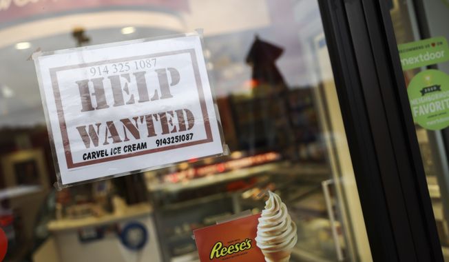 A help wanted sign in a storefront, Tuesday, Nov. 1, 2022, in Bedford, N.Y. The Federal Reserve may reach a turning point this week as it announces what&#x27;s expected to be another substantial three-quarter-point hike in its key interest rate. The Fed&#x27;s hikes have already led to much costlier borrowing rates, ranging from mortgages to auto and business loans.   (AP Photo/Julia Nikhinson)