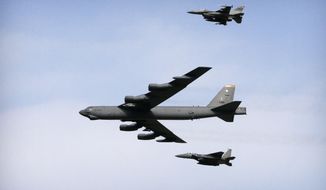 A U.S. Air Force B-52 bomber flies over Osan Air Base in Pyeongtaek, South Korea, Jan 10, 2016. The Australian defense minister on Wednesday, Nov. 2, 2022, played down the significance of a major upgrade of B-52 facilities planned for northern Australia that has raised China’s ire, saying the nuclear-capable U.S. bombers had been visiting since the 1980s. (AP Photo/Ahn Young-joon) **FILE**