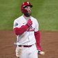 Philadelphia Phillies&#x27; Bryce Harper walks to the dugout after striking out during the fourth inning in Game 4 of baseball&#x27;s World Series between the Houston Astros and the Philadelphia Phillies on Wednesday, Nov. 2, 2022, in Philadelphia. (AP Photo/Chris Szagola) **FILE**