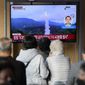 A TV screen showing a news program reporting about North Korea&#39;s missile launch with file footage is seen at the Seoul Railway Station in Seoul, South Korea, Thursday, Nov. 3, 2022. North Korea continued its barrage of weapons tests on Thursday, firing at least three missiles including a suspected intercontinental ballistic missile that forced the Japanese government to issue evacuation alerts and temporarily halt trains.  (AP Photo/Lee Jin-man)