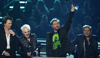 Inductees John Taylor, from left, Nick Rhodes, Simon Le Bon, and Roger Taylor of Duran Duran speak during the Rock &amp;amp; Roll Hall of Fame Induction Ceremony on Saturday, Nov. 5, 2022, at the Microsoft Theater in Los Angeles. (AP Photo/Chris Pizzello)