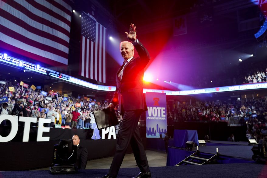 President Joe Biden waves after speaking at a campaign rally for Pennsylvania&#x27;s Democratic gubernatorial candidate Josh Shapiro and Democratic Senate candidate Lt. Gov. John Fetterman, Saturday, Nov. 5, 2022, in Philadelphia. (AP Photo/Patrick Semansky)