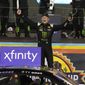 Ty Gibbs celebrates after winning the NASCAR Xfinity Series auto race and the season championship Saturday, Nov. 5, 2022, in Avondale, Ariz. (AP Photo/Rick Scuteri) **FILE**