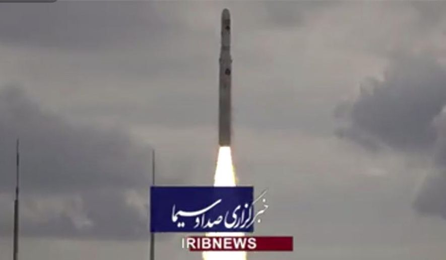 This image taken from video footage aired by Iranian state television on Saturday, Nov. 5, 2022, shows the launch of a satellite carrier rocket by Iran’s Revolutionary Guard from an undisclosed desert location. Iran’s powerful paramilitary Guard launched the rocket as nationwide protests continue to engulf the country. (Iranian state television via AP)