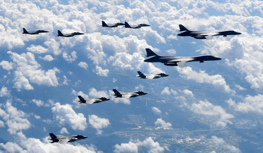 In this photo provided by South Korea Defense Ministry, U.S. Air Force B-1B bombers, F-35B stealth fighter jets and South Korean F-15K fighter jets fly over the Korean Peninsula during joint drills on Sept. 18, 2017. (South Korea Defense Ministry via AP, File)