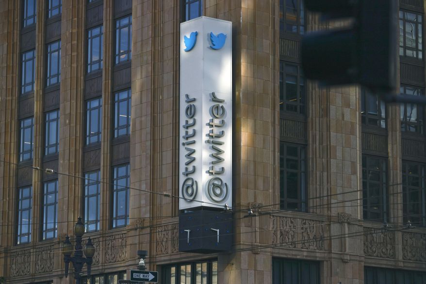 Twitter signage is seen outside Twitter headquarters on Friday, Nov. 4, 2022, in San Francisco. Twitter began widespread layoffs Friday as new owner Elon Musk overhauls the company, raising concerns about chaos enveloping the social media platform and its ability to fight disinformation just days ahead of the U.S. midterm elections. (Lea Suzuki/San Francisco Chronicle via AP)