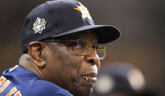 Houston Astros manager Dusty Baker Jr. watches play during the first inning in Game 6 of baseball&#39;s World Series between the Houston Astros and the Philadelphia Phillies on Saturday, Nov. 5, 2022, in Houston. (AP Photo/David J. Phillip)
