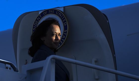 Vice President Kamala Harris boards Air Force Two at Chicago&#x27;s Midway International Airport after a trip to Chicago, Sunday, Nov. 6, 2022. (AP Photo/Matt Marton)