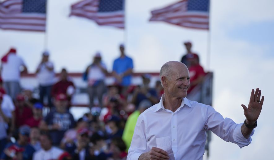 Sen. Rick Scott, R-Fla., arrives to speak before former President Donald Trump at a campaign rally in support of the campaign of Sen. Marco Rubio, R-Fla., at the Miami-Dade County Fair and Exposition on Sunday, Nov. 6, 2022, in Miami. (AP Photo/Rebecca Blackwell)