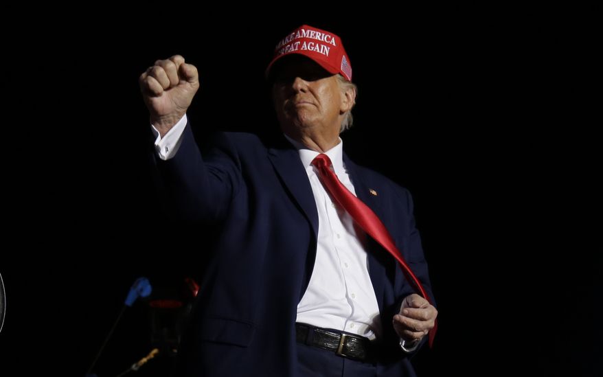 Former President Donald Trump pumps his fist toward the crowd at the conclusion of an election rally in Latrobe, Pa. Saturday, Nov. 5, 2022. (AP Photo/Jacqueline Larma)