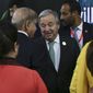 U.N. Secretary-General Antonio Guterres, center, speaks with Prime Minister of Pakistan Muhammad Shehbaz Sharif, center left, after a joint news conference at the COP27 U.N. Climate Summit, Monday, Nov. 7, 2022, in Sharm el-Sheikh, Egypt. (AP Photo/Thomas Hartwell)